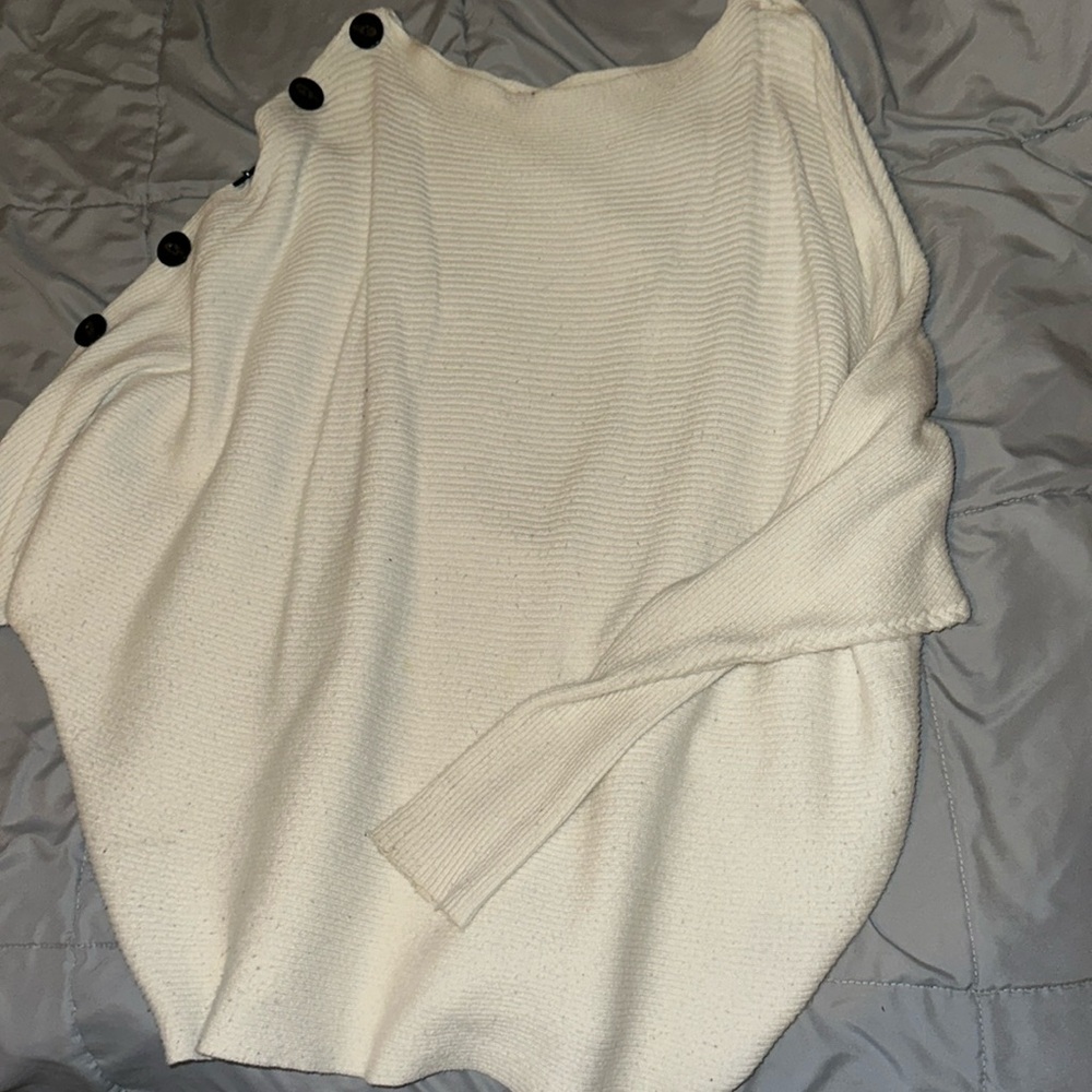 Cream oversized sweater with black buttons